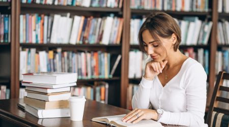 Student woman studying at the library